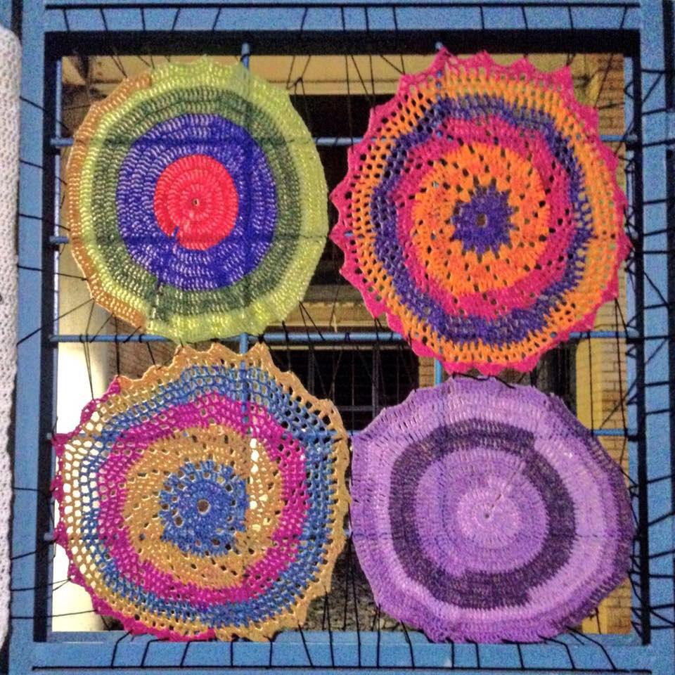 LMU staff Nicole Murph's crocheted circles in Dunning Courtyard made in collaboration with YarnBombingLA
