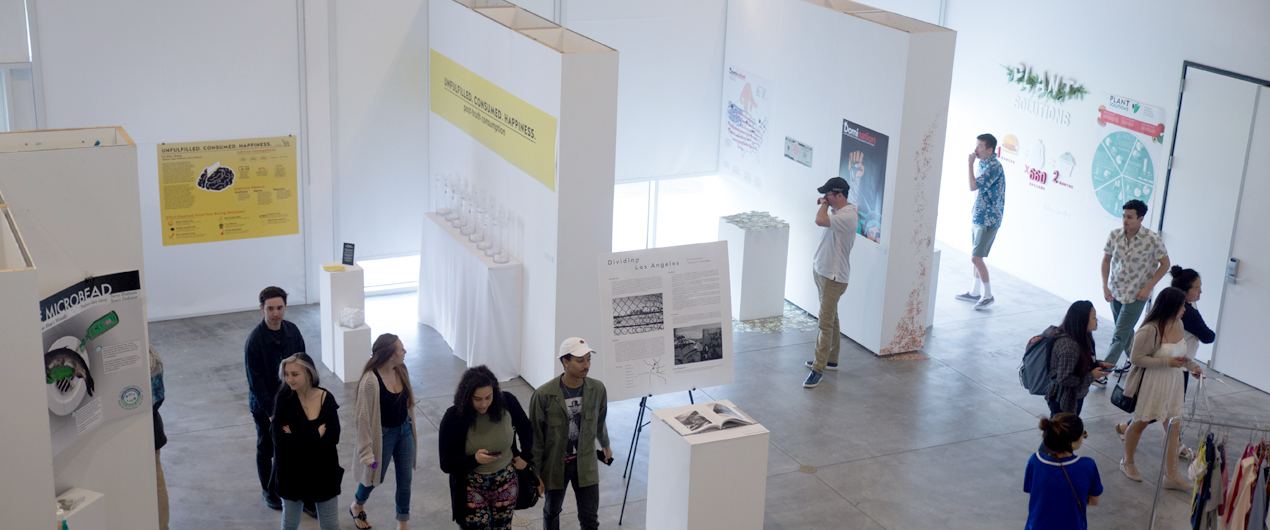 Overhead view of visitors at the 2017 Graphic Design Senior Exhibition.
