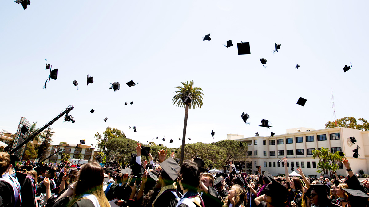 Students celebrating at commencement.