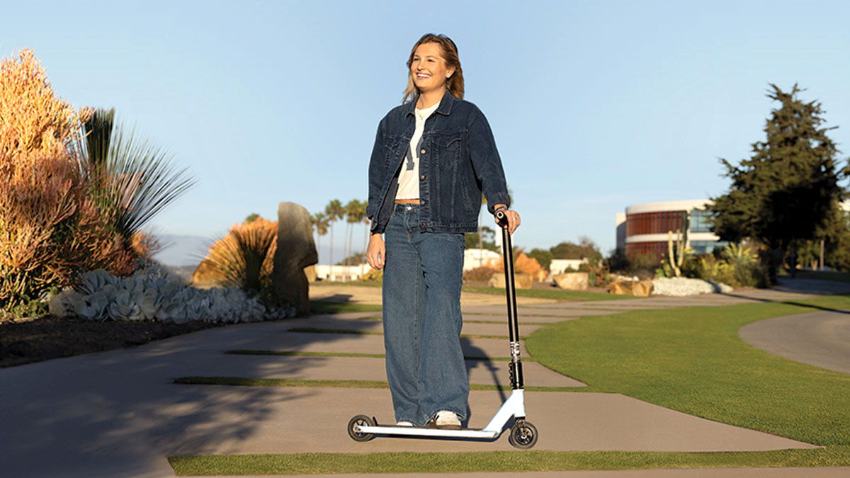 Delany Ball '27 with her scooter by the Bluff.