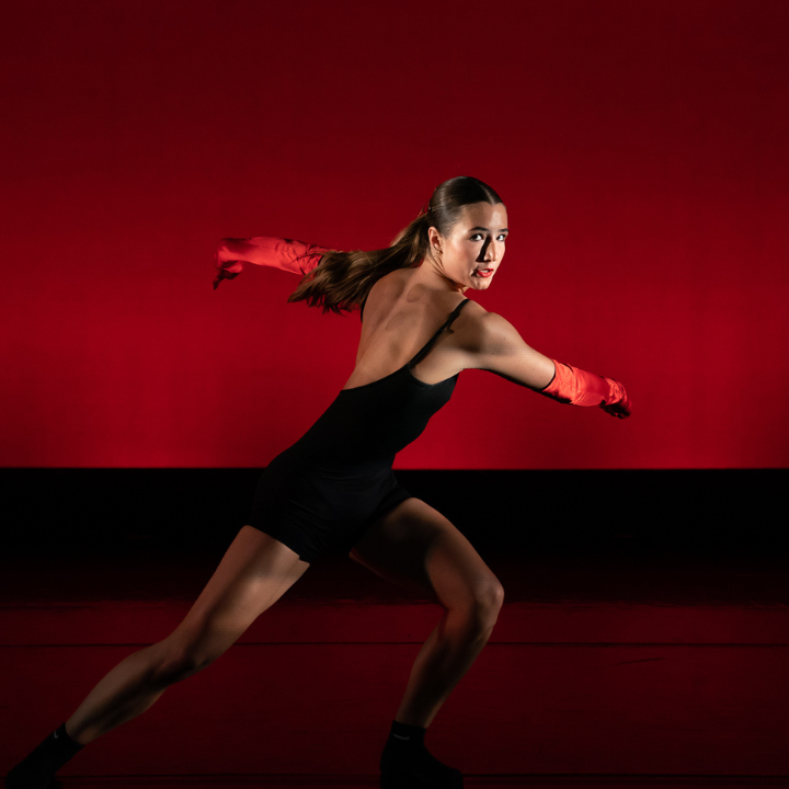 A dancer performing during a Senior Thesis Concert.