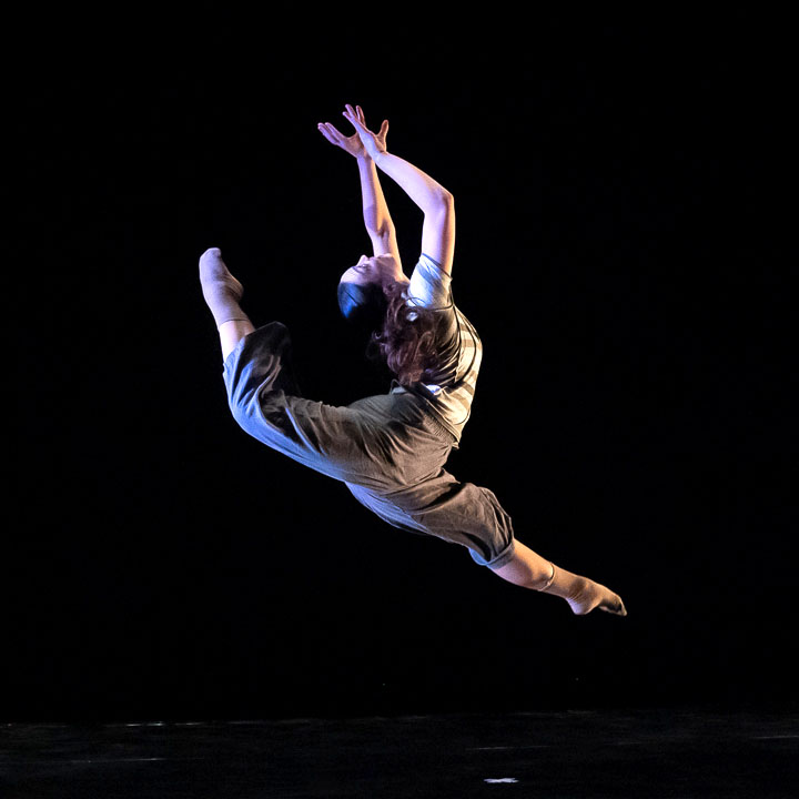 A dancer leaping into the air.