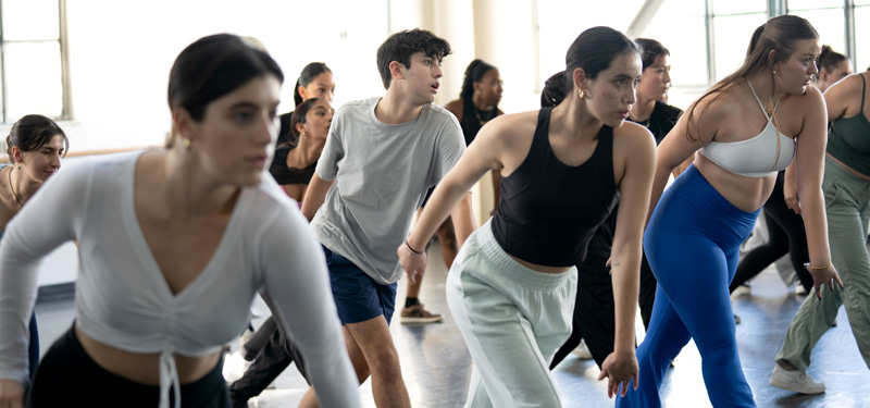A dance class participating in a Plunge workshop.