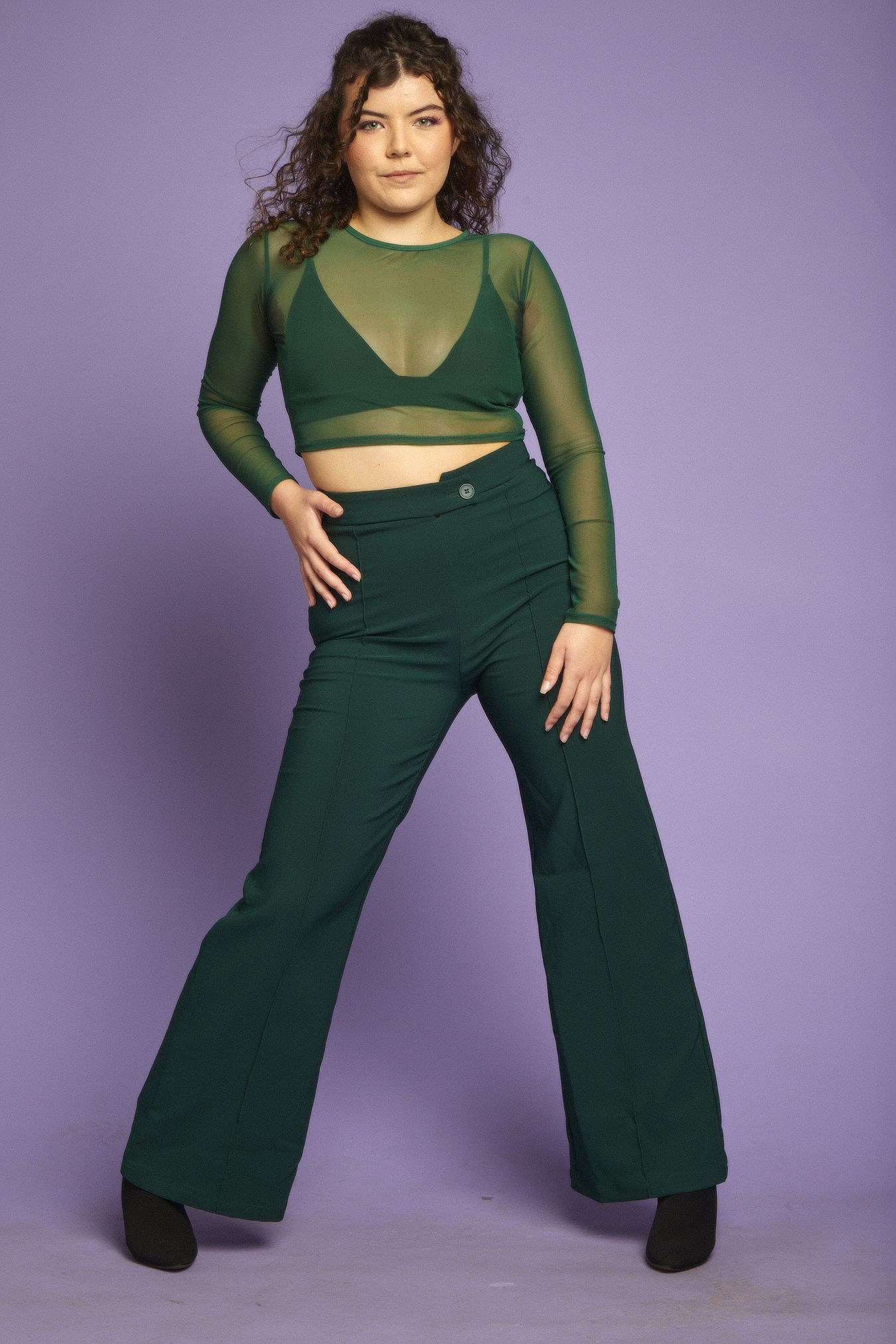 A young woman in a dance pose