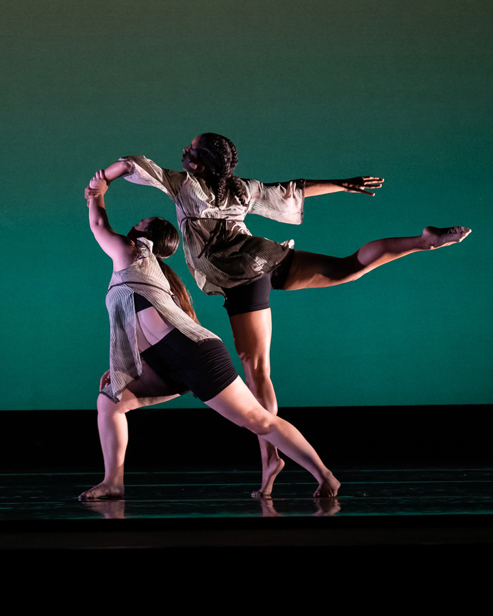 Two dancers perform together during the Spring Student Concert 2022.