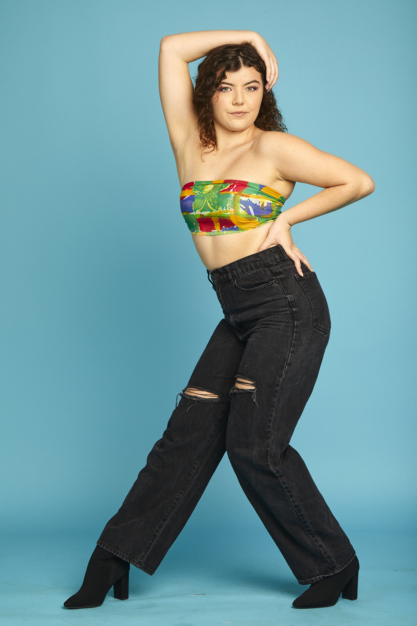 A young woman in a dance pose