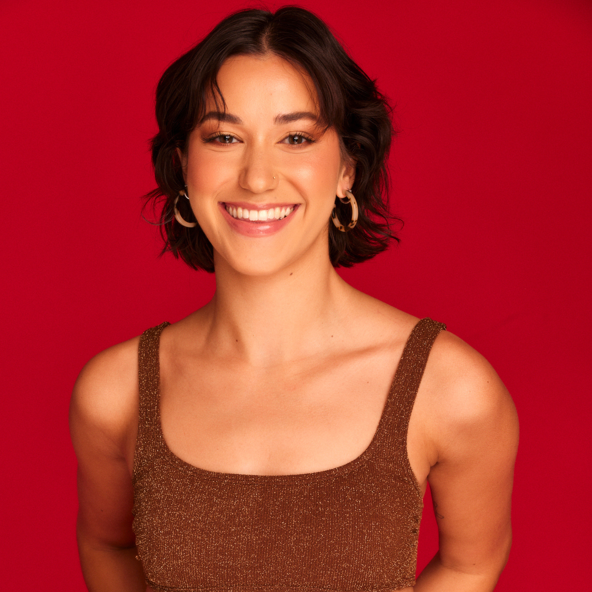 a woman with short hair posing.