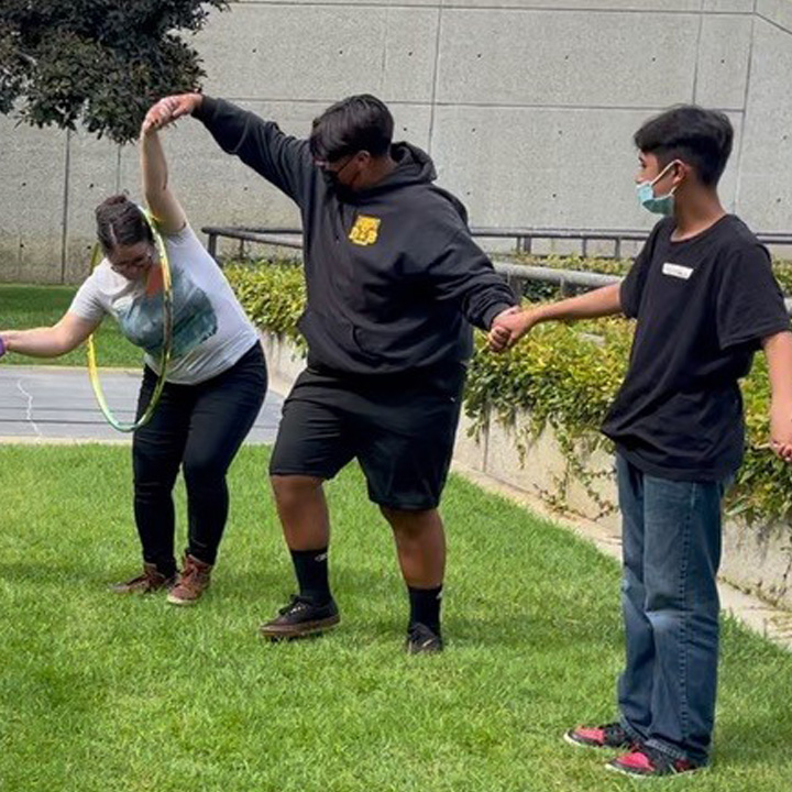 A group of people participating in an Art Therapy exercise.