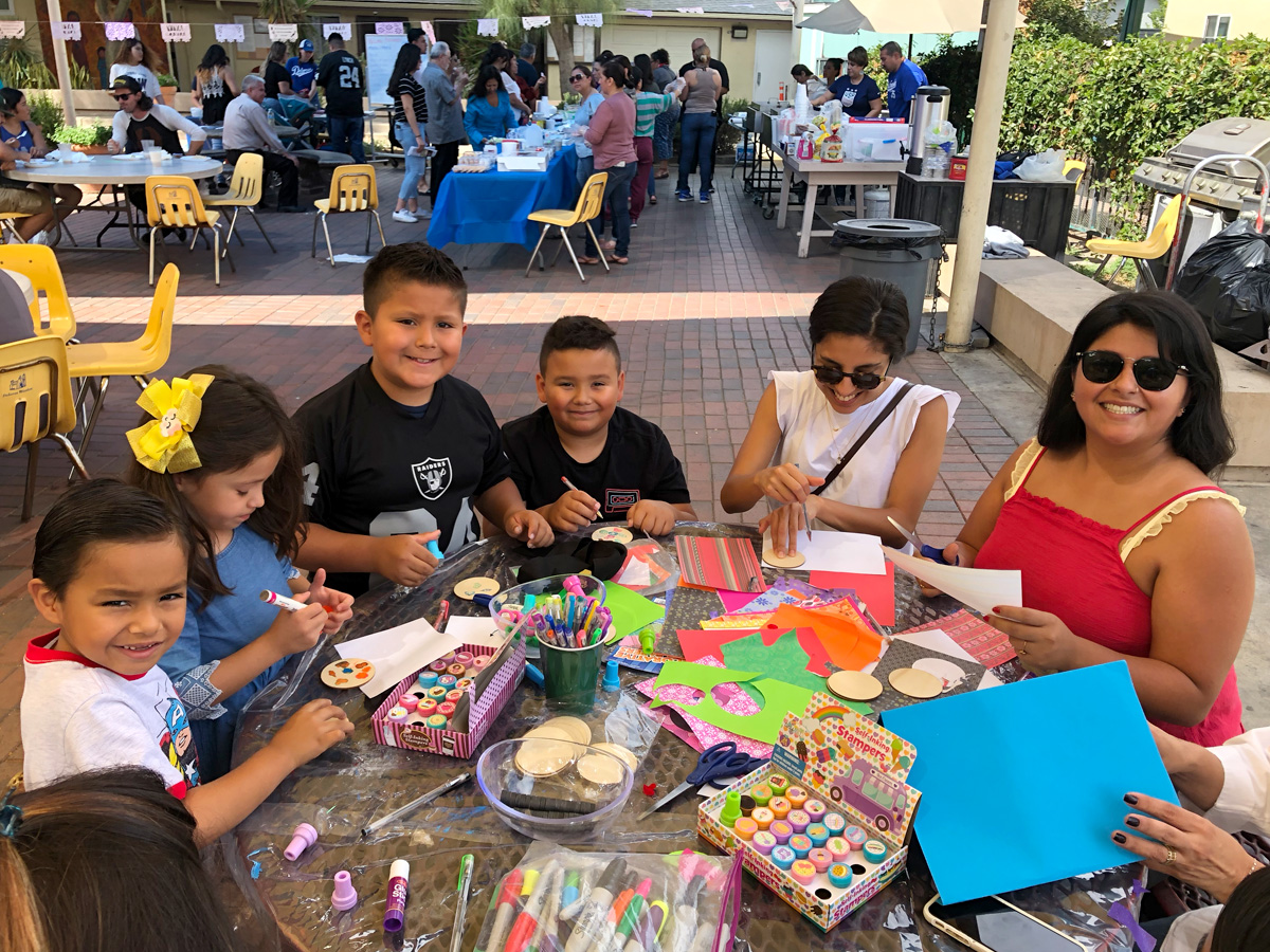 People creating artwork at the 2019 SAW.