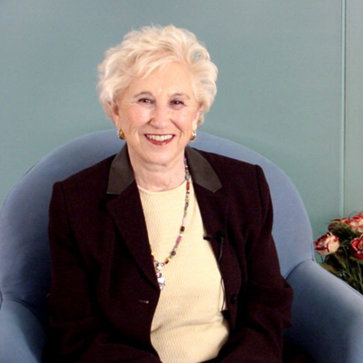 Photo of Helen B. Landgarten sitting in a chair.
