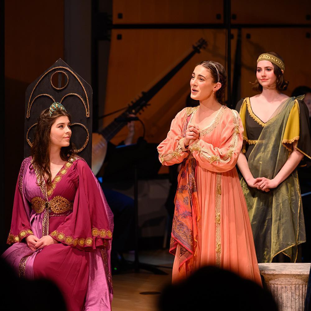 Three students performing in the opera, 