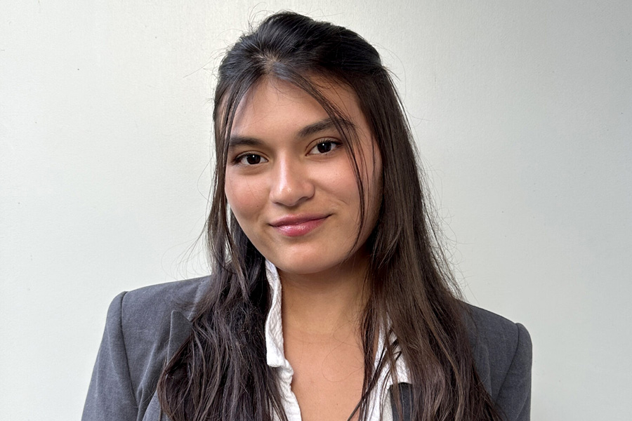 Photo of Alani Jordal in business attire.