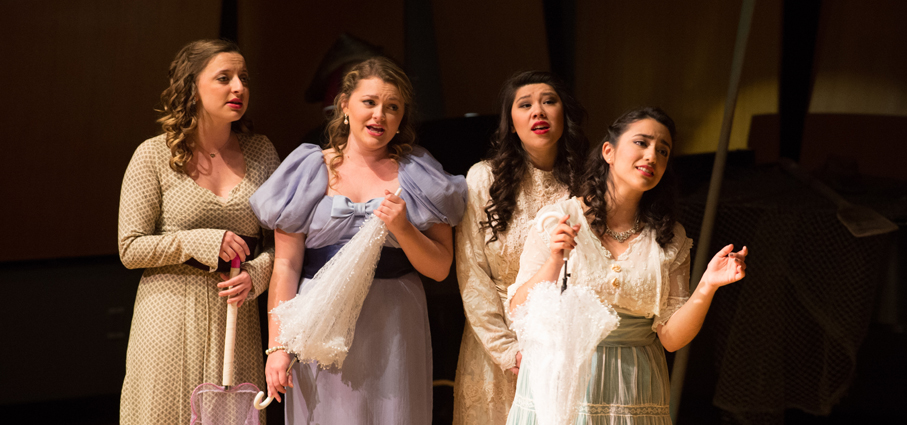 A group of students performing in an opera in Murphy Recital Hall.
