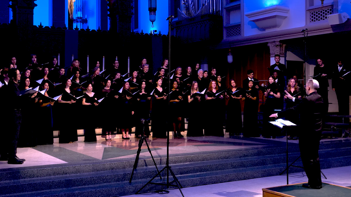 Concert Choir, Consort Singers, and Oriana Vocal Ensemble performing Silent Night at the 2025 Gala Christmas Concert.