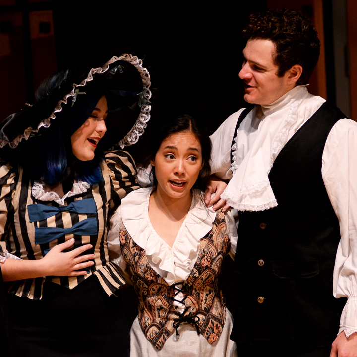 Three singers performing in The Marriage of Figaro.