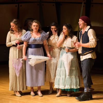 Five students performing in an opera in Murphy Recital Hall.