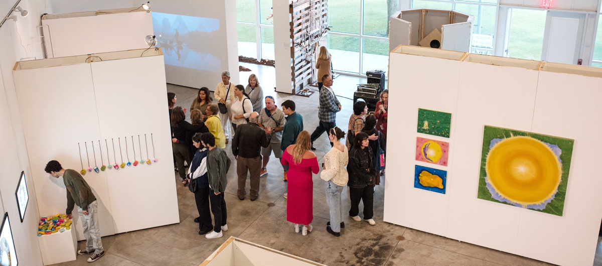 A view of the student gallery at the 2024 Fine Art and Multimedia Senior Exhibition.