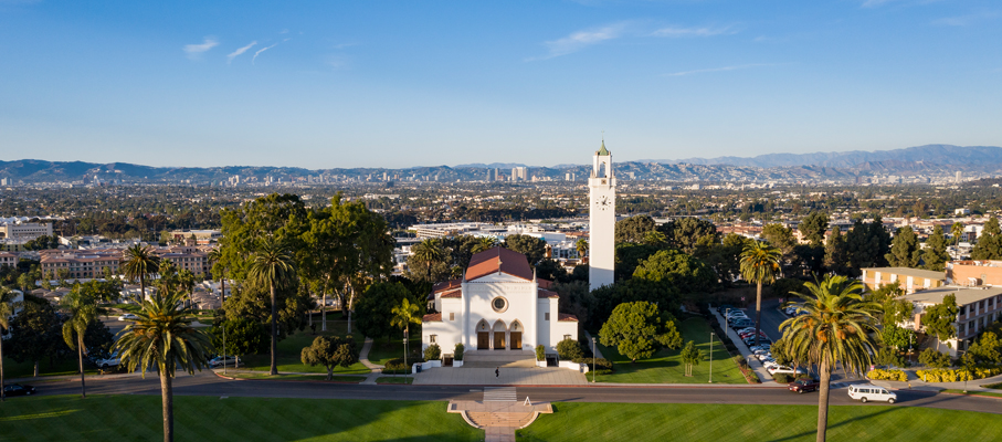 Aerial view of Los Angeles with Sacred Heart Chapel in the foreground.