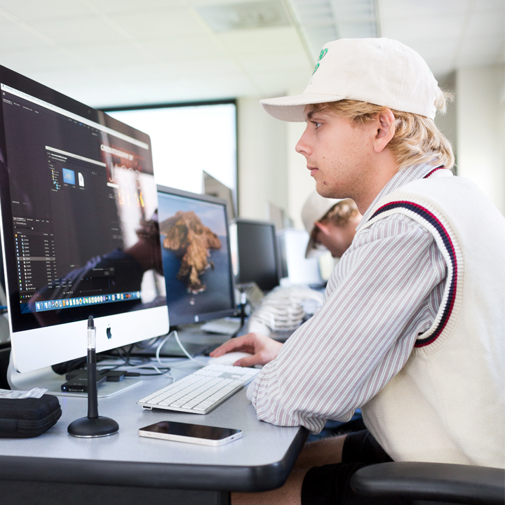 A student working on a motion graphics assignment at the Foley Lab.
