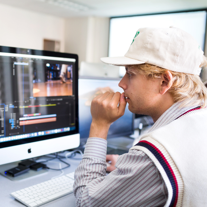 A multimedia student working on an assignment in the Foley lab.
