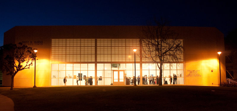 A photo of the TPK Student Gallery at night.