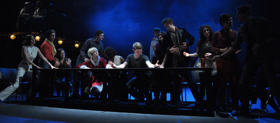 Group of people performing in Rent.