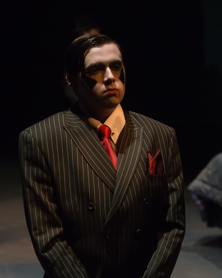 Student performing in The Resistable Rise of Arturo Ui.