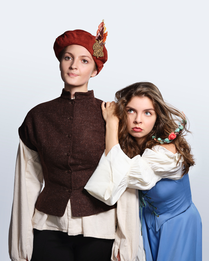 Two characters pose in a promo image for As You Like It.