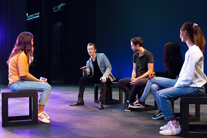 A group of students participate in an exercise during an MFAPP class.