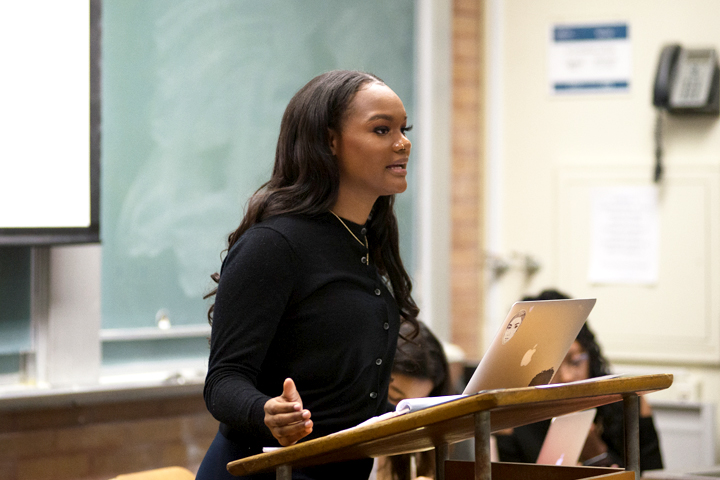 A student speaks during a debate.