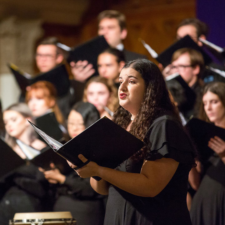 Students singing in a choir performance
