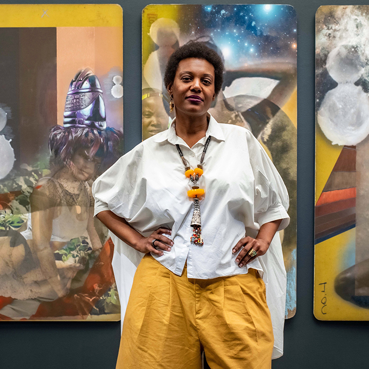 Jessica standing in front of art.