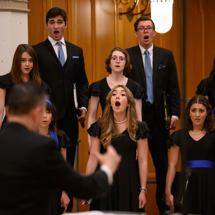A choir performing during a concert.
