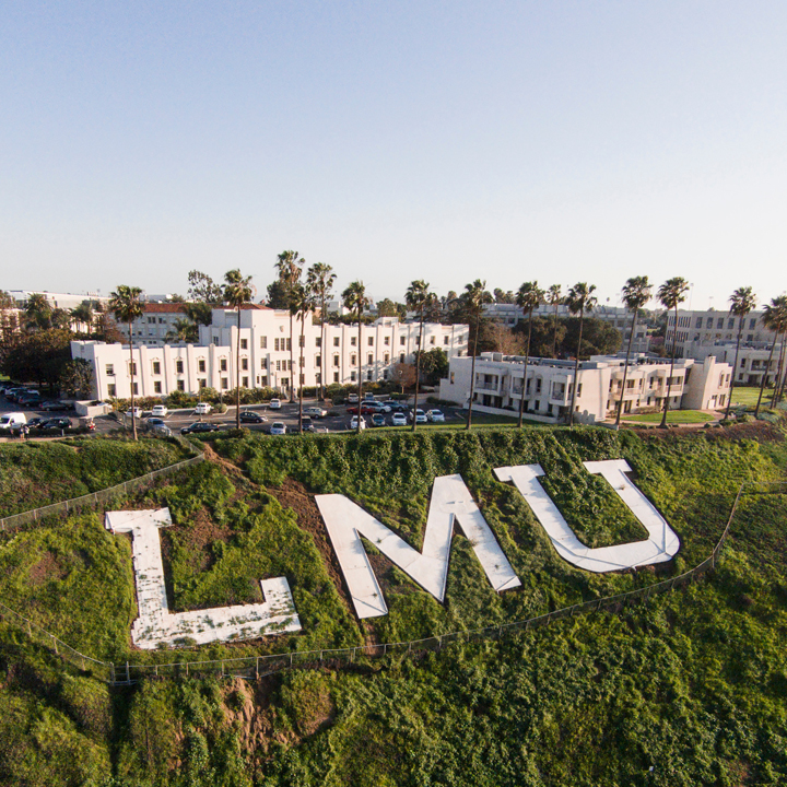 Aerial shot of the Bluff, LMU letters, and the campus.